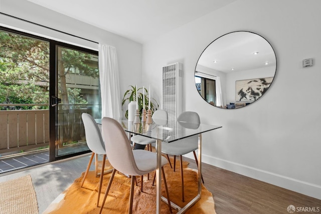 dining room with hardwood / wood-style flooring