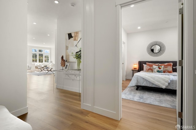 bedroom with light wood-type flooring