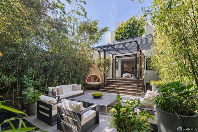 view of patio / terrace with an outdoor living space and a pergola