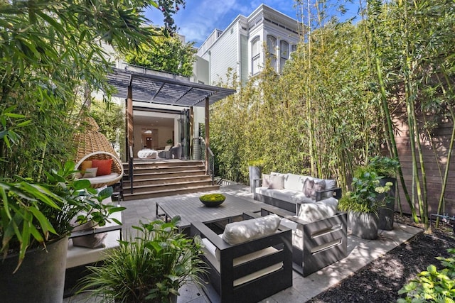 view of patio / terrace with an outdoor hangout area and a pergola