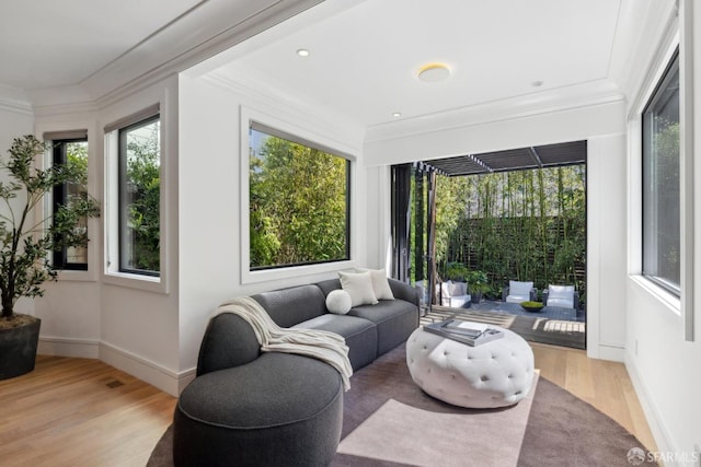 sunroom / solarium featuring healthy amount of natural light