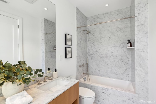 bathroom featuring toilet, a combined bath / shower with marble appearance, vanity, and recessed lighting