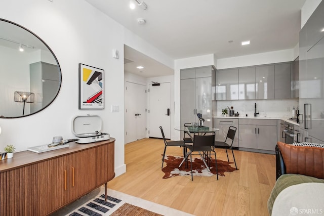 dining room featuring light wood-style flooring