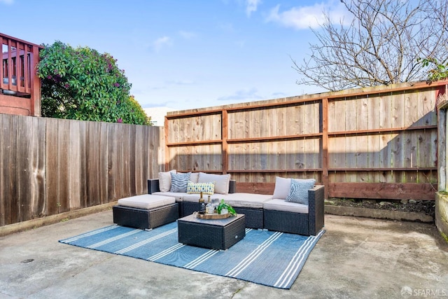 view of patio with a fenced backyard and an outdoor living space