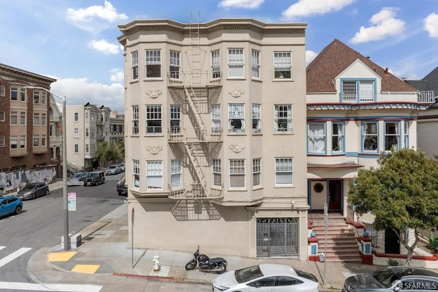 view of building exterior with central AC