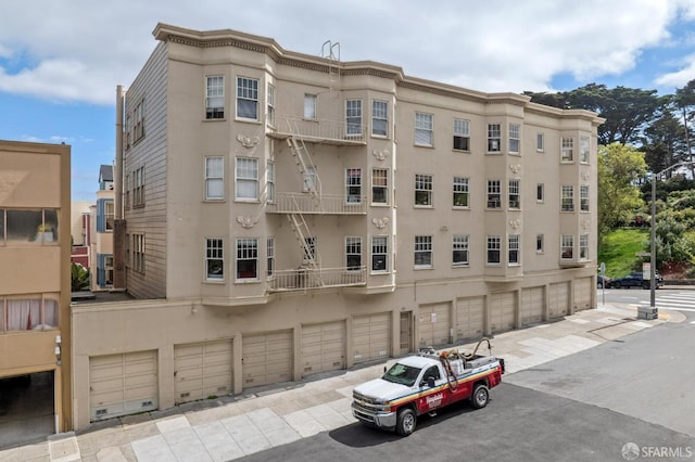 view of building exterior featuring an attached garage