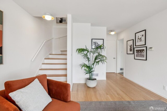 75 Lurline St, San Francisco, CA 94122 - stairs with wood finished floors and baseboards