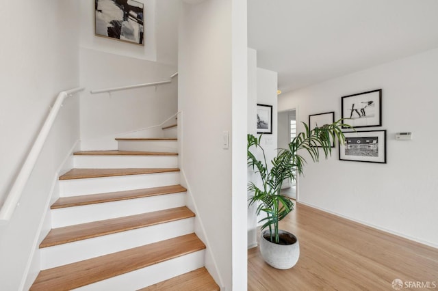 75 Lurline St, San Francisco, CA 94122 - stairs featuring wood finished floors