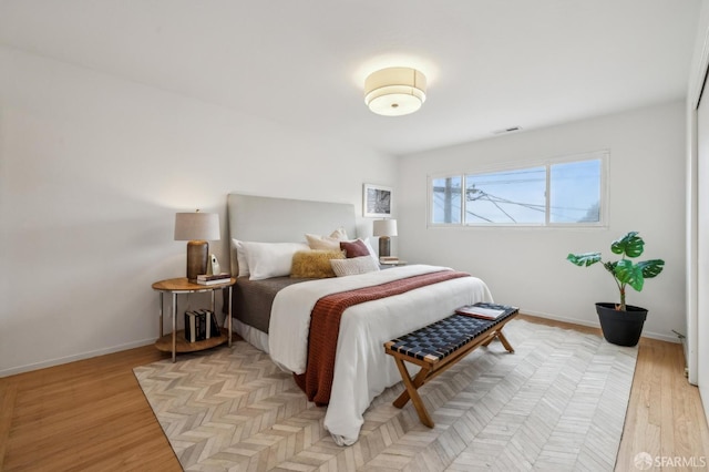 75 Lurline St, San Francisco, CA 94122 - bedroom featuring light wood-style flooring and baseboards