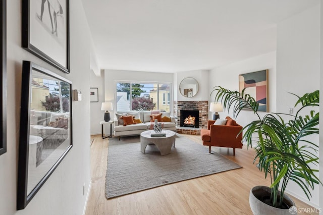 75 Lurline St, San Francisco, CA 94122 - living area featuring a fireplace and wood finished floors