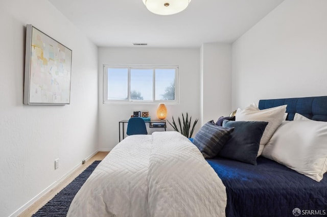 75 Lurline St, San Francisco, CA 94122 - bedroom featuring wood finished floors and baseboards