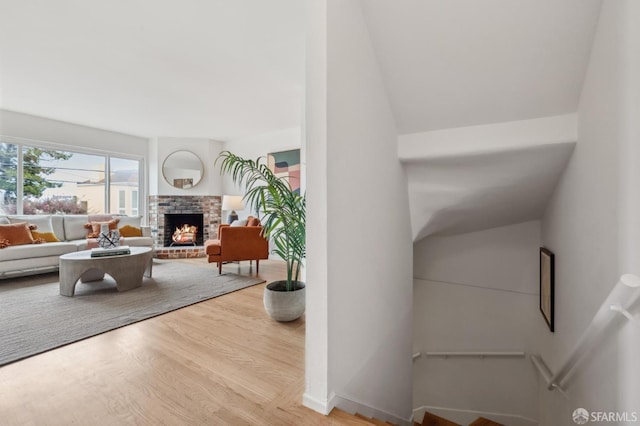 75 Lurline St, San Francisco, CA 94122 - living area with wood finished floors and a brick fireplace