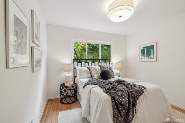 75 Lurline St, San Francisco, CA 94122 - bedroom with wood finished floors and baseboards