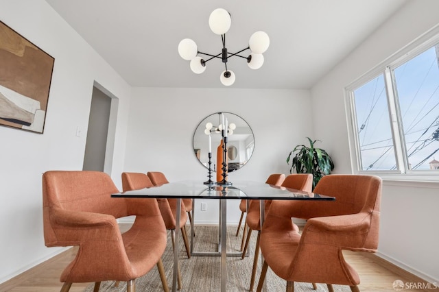 75 Lurline St, San Francisco, CA 94122 - dining space with a chandelier, baseboards, and plenty of natural light
