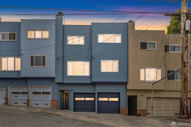 75 Lurline St, San Francisco, CA 94122 - property at dusk featuring an attached garage