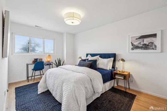 75 Lurline St, San Francisco, CA 94122 - bedroom with wood finished floors and baseboards