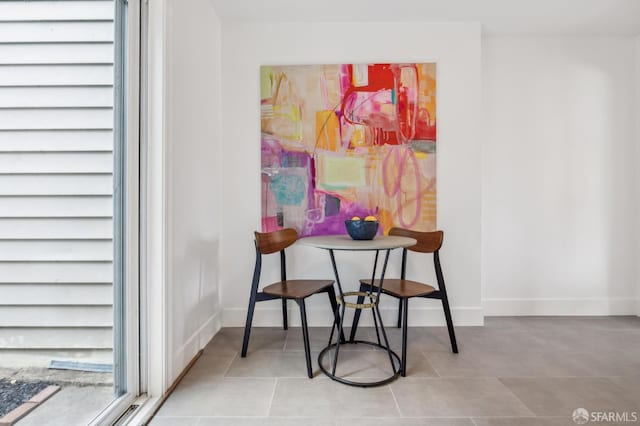 75 Lurline St, San Francisco, CA 94122 - tiled dining room featuring baseboards