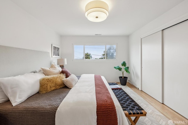 75 Lurline St, San Francisco, CA 94122 - bedroom featuring light wood finished floors and a closet