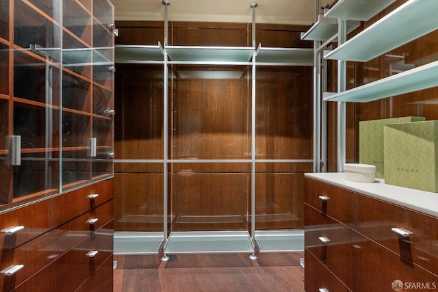 947 Green St Unit 6, San Francisco, CA 94133 - walk in closet featuring dark wood-style flooring