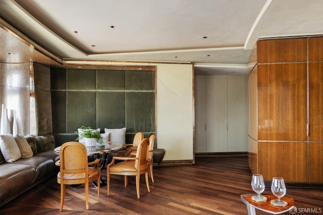 dining space with wood finished floors
