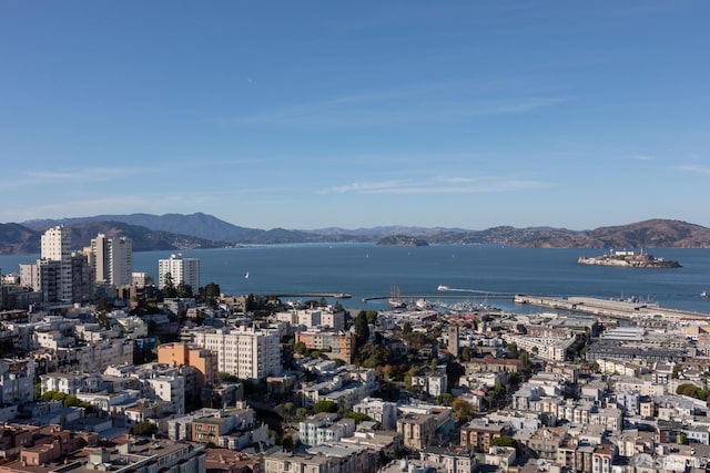 view of urban area with a water and mountain view