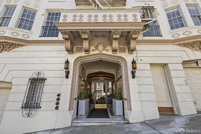 property entrance featuring stone siding