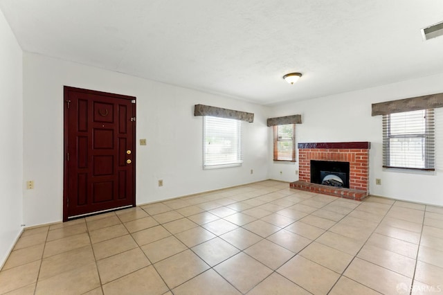 1220 Mesa St, Concord, CA 94518 - unfurnished living room with light tile patterned floors and a fireplace