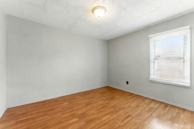 1220 Mesa St, Concord, CA 94518 - unfurnished room with light wood finished floors and a textured ceiling
