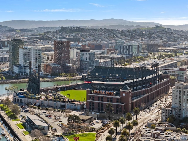 city view featuring a water and mountain view