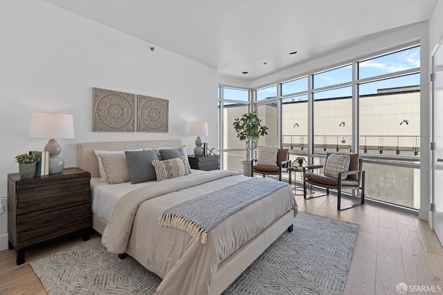 bedroom with light wood-type flooring