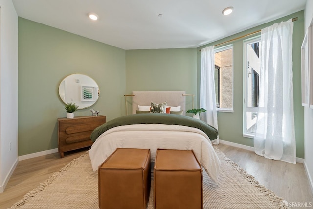 bedroom featuring light hardwood / wood-style floors