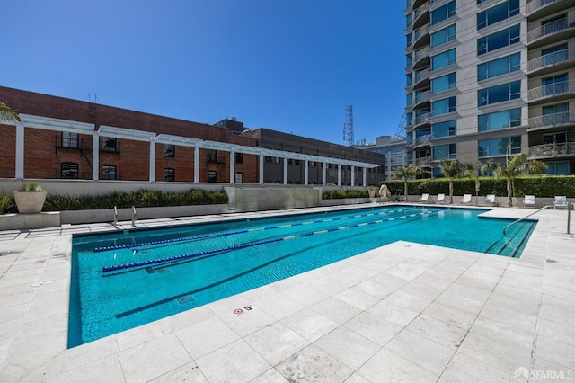 view of pool with a patio area