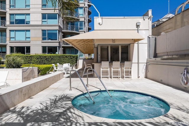 view of pool with a patio area