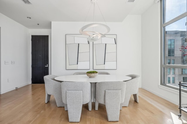 dining room featuring light wood-type flooring