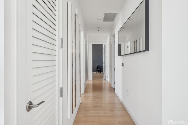 hallway featuring light hardwood / wood-style flooring