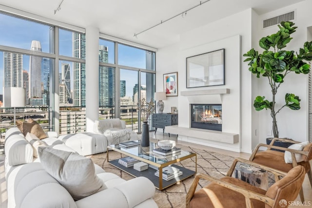 living room with a wall of windows