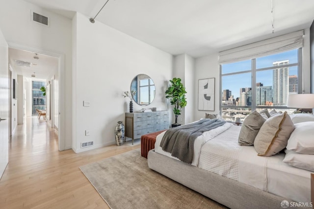 bedroom featuring light hardwood / wood-style flooring