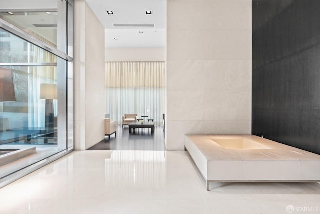 bathroom with a high ceiling