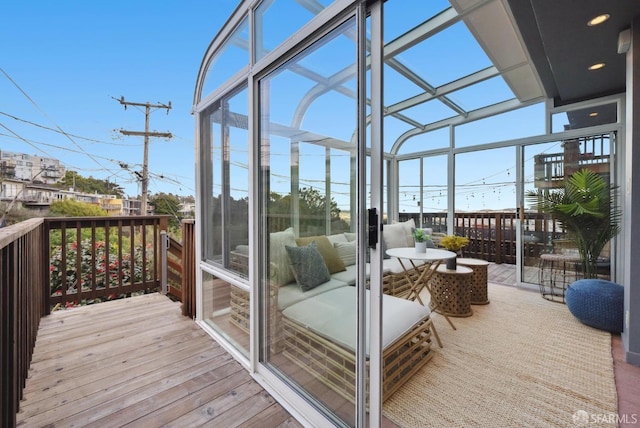 wooden deck with a lanai