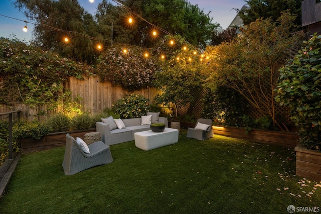 view of yard with a fenced backyard and an outdoor hangout area
