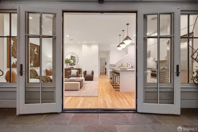 doorway featuring recessed lighting