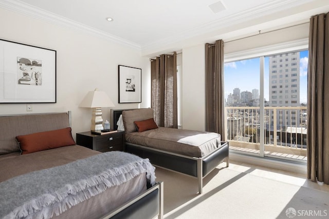 bedroom with crown molding, access to outside, and a view of city