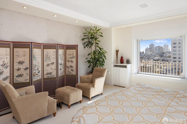 bedroom with ornamental molding and light carpet