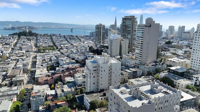 property's view of city with a water view