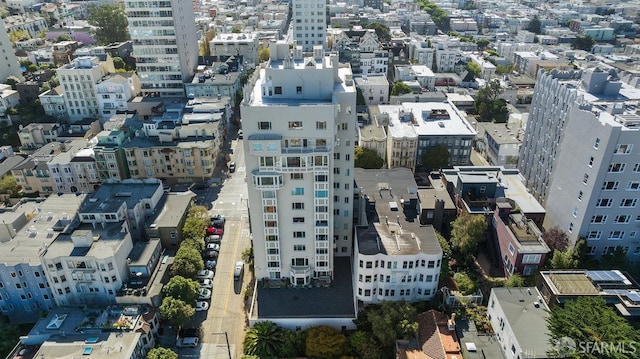 birds eye view of property with a city view