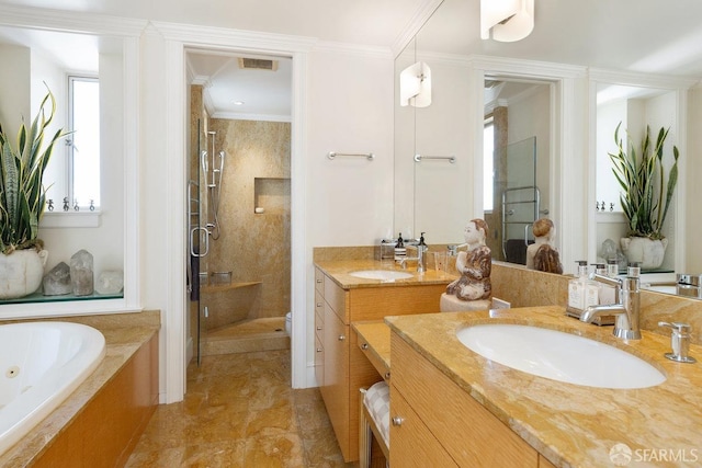 bathroom featuring independent shower and bath, vanity, and ornamental molding