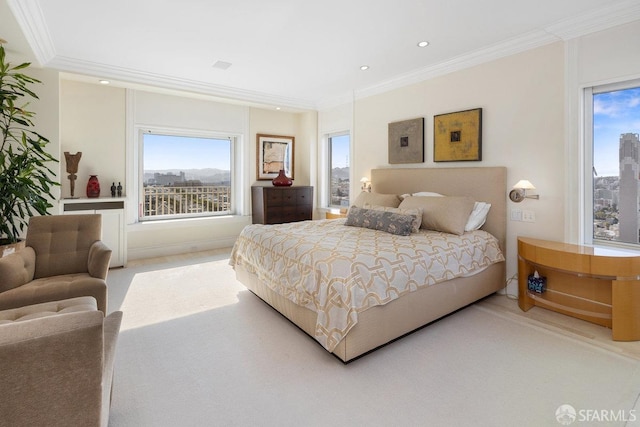 carpeted bedroom with ornamental molding