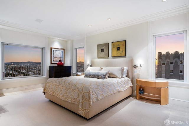bedroom with recessed lighting and ornamental molding