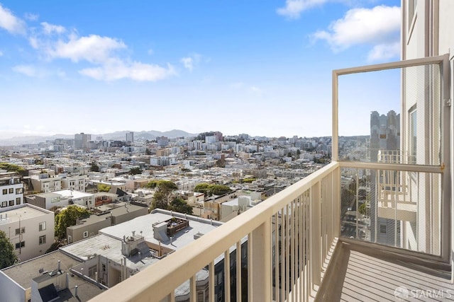 balcony featuring a mountain view