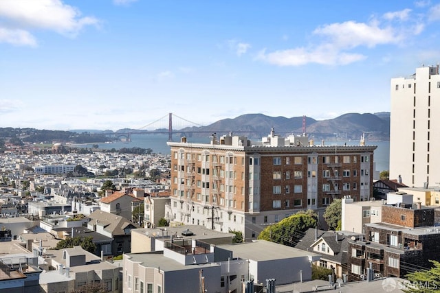 city view with a water and mountain view